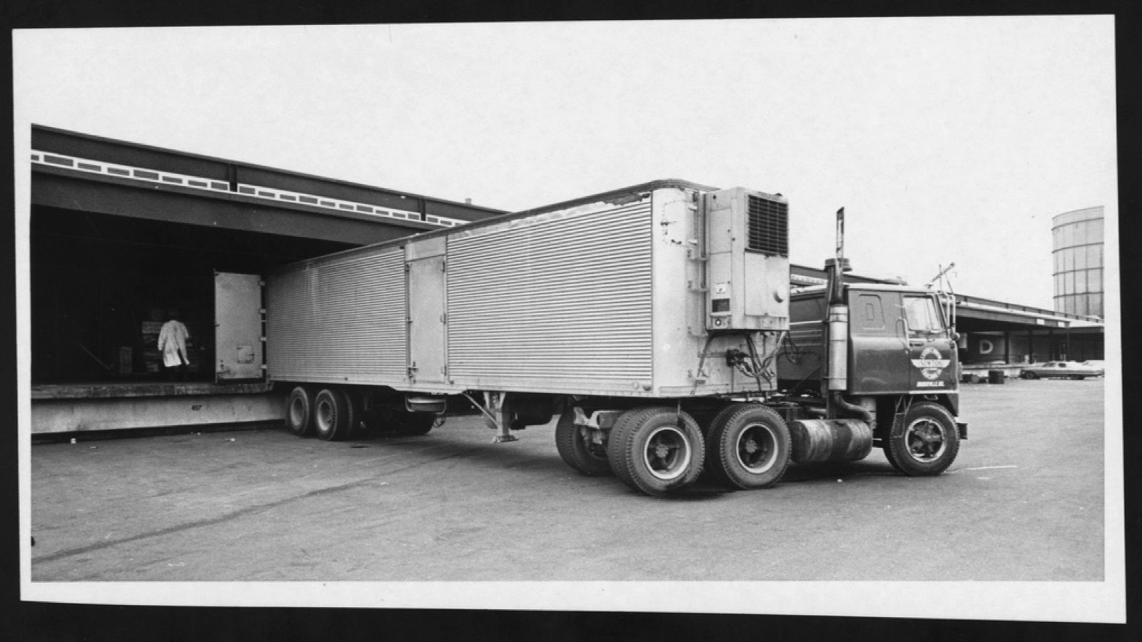 Box truck at a loading dock for Tampa Bay last mile delivery and commercial freight
